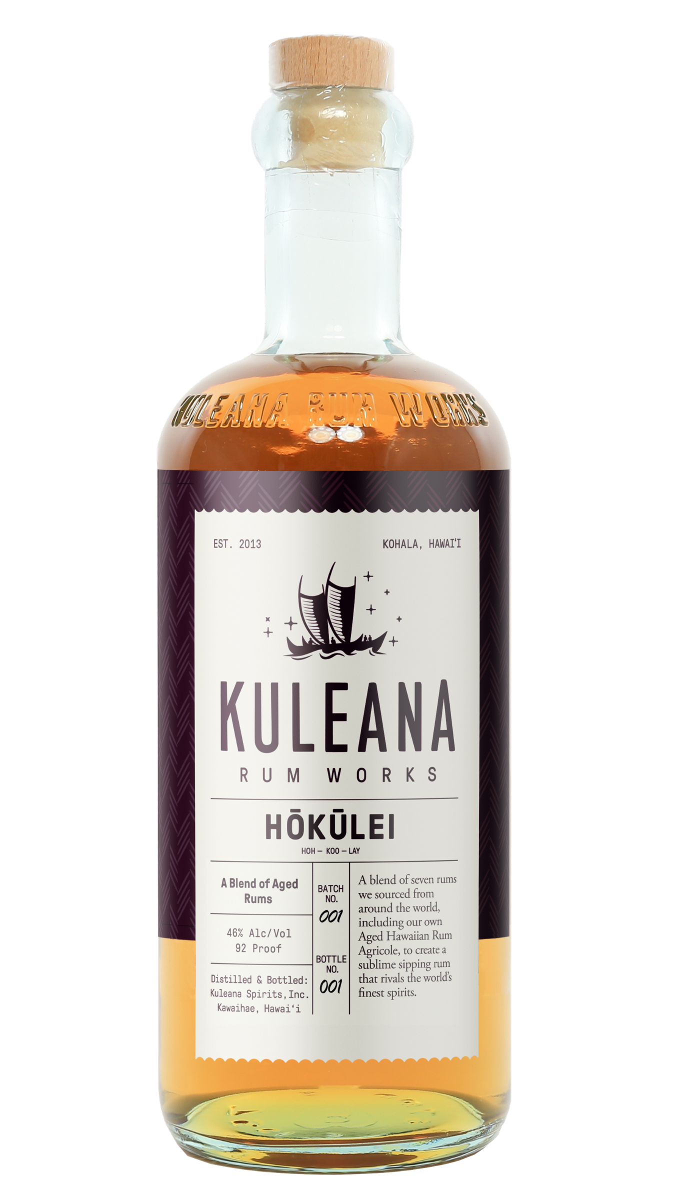 A bottle of Kuleana Rum Works Hóküliéi rum on a plain white background. The clear glass bottle shows the amber-colored liquid inside, topped with a light brown cork.